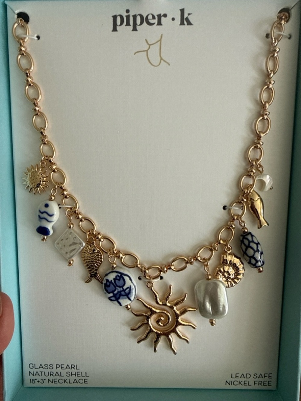 Piper K Gold Sun Charm Necklace with Blue and White Accents